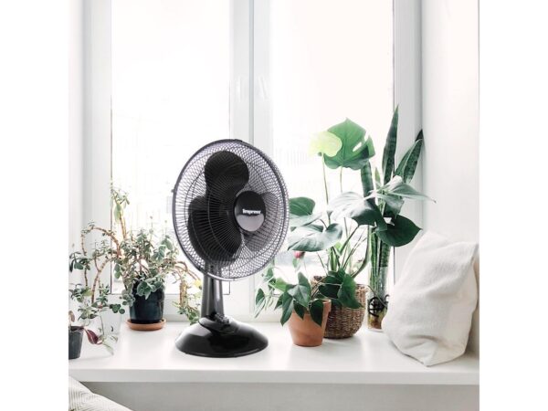 Impress 12-inch oscillating table fan (IM-713B): efficient cooling with multiple speeds, compact and elegant design, ideal for home or office.